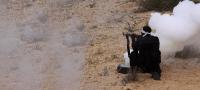 hamas fighter firing gun